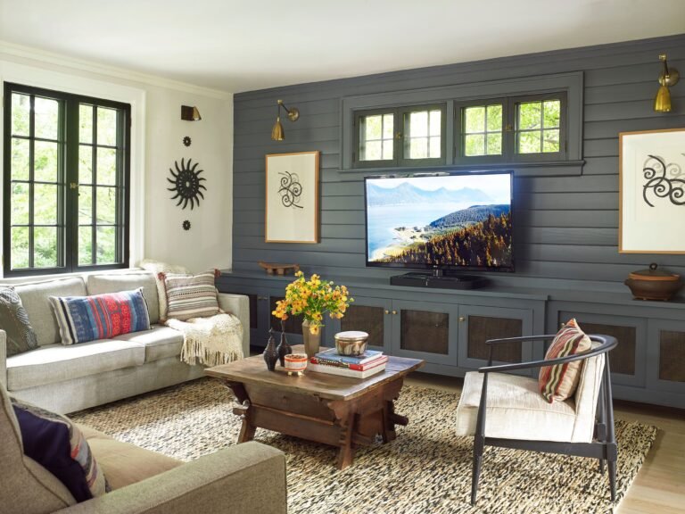 20 Bold Sconces Over Floating Shelves: Living Room Styling with Geometric Chairs & Crown Molding